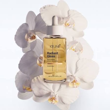 Add instant shine and smoothness with Keune Radiant Gloss Oil, available at BB Hair Art Salon. This