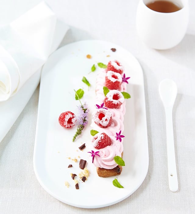 a dessert with a cup of coffee and a cup of coffee