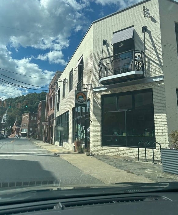 White Brick building Marshall, NC— On Your Bike, shown as part of Asheville Locksmith Now's service area