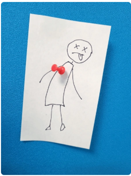 a drawing of a stick figure with a red push pin in the heartpin