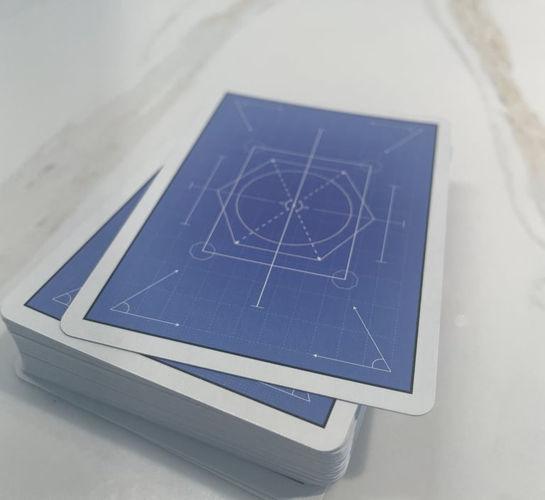 Back side view of stack of playing cards. Shows engineering and mathematics themed abstract art