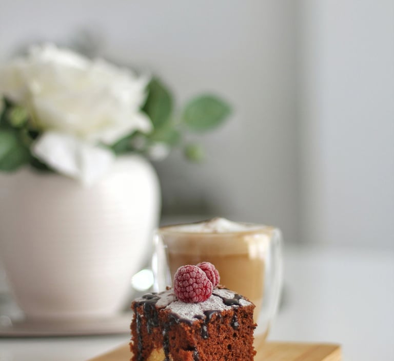 a piece of cake with a cup of coffee