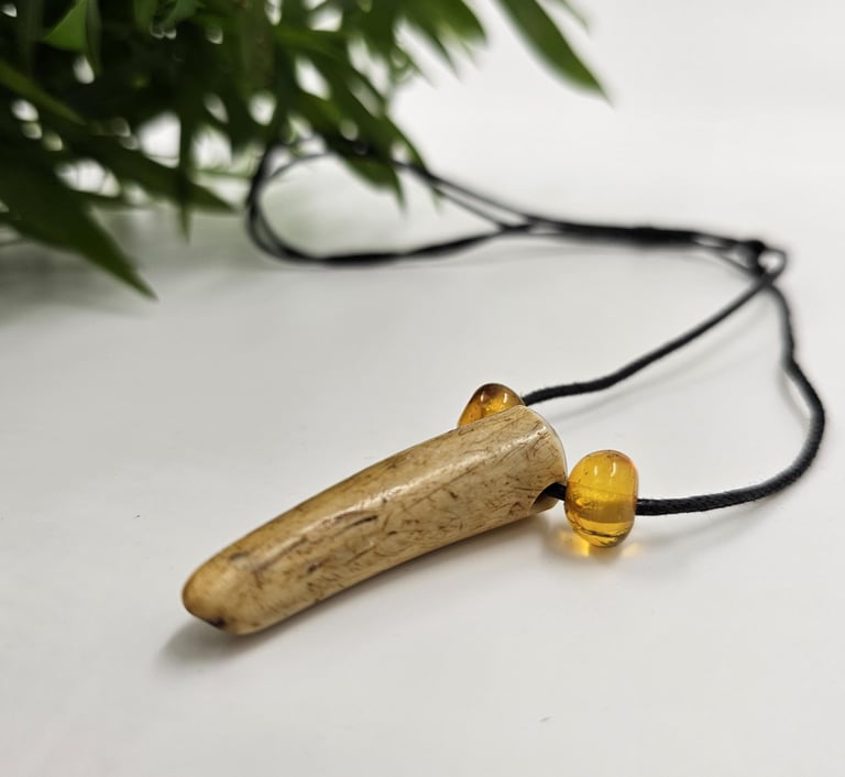 Antler pendant with amber
