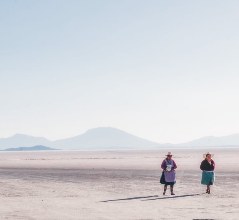 Two cholitas in Salar de Uyuni, Bolivia, South America