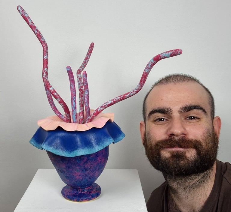 Sylvester Zagato and one of his sculpture