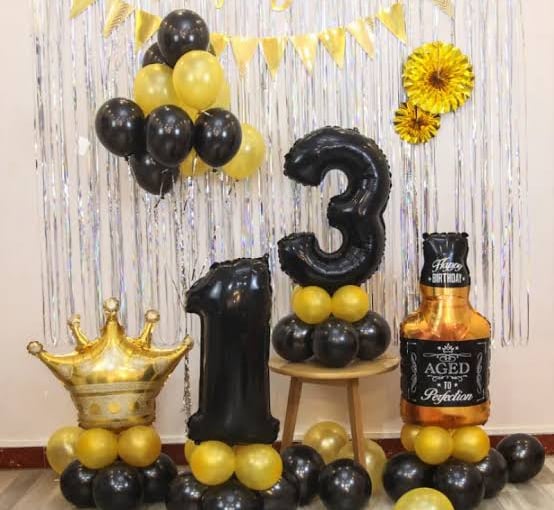 a birthday party with balloons and balloons