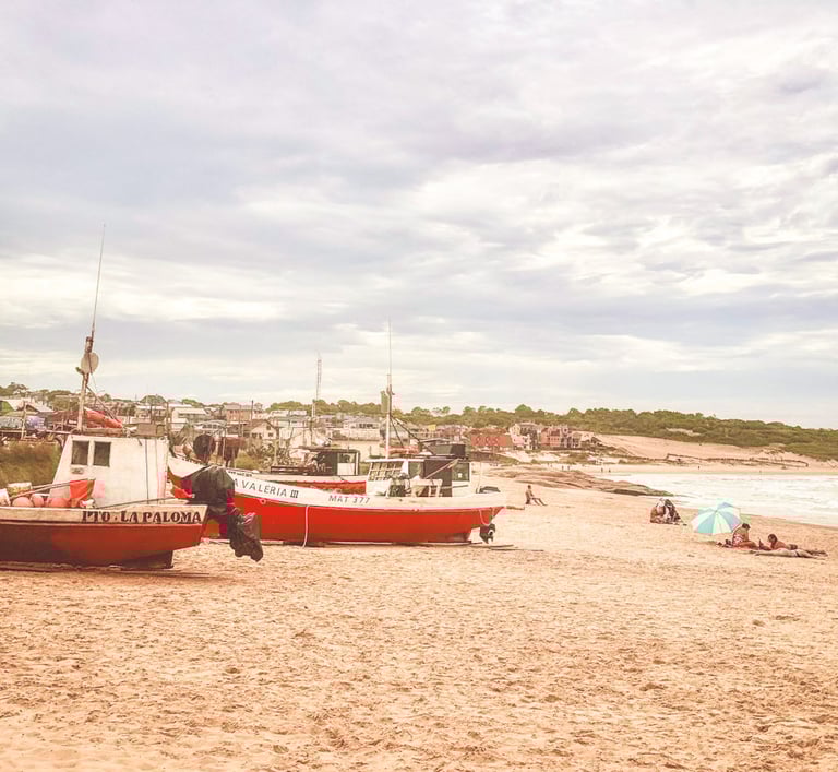 Boats on the beach in Punta Del Diablo in Uruguay