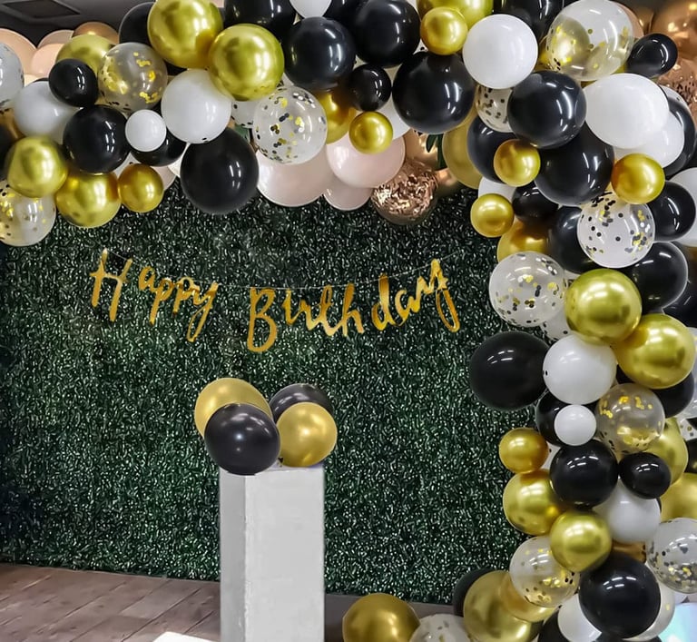 a birthday party with balloons and balloons