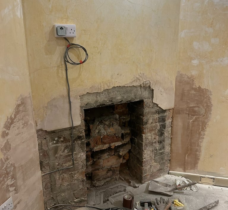 Fireplace out... waiting to become an entertainment centre!