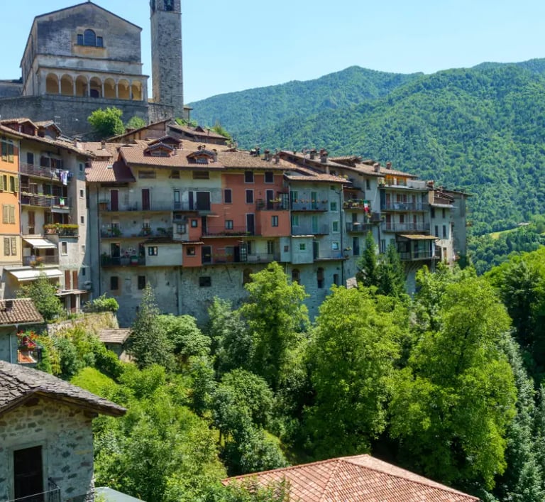 Alpine village of Bagolino alive with violin music and dancers during Carnival