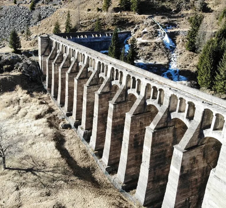 Ruins of the Gleno Dam arches in the Val di Scalve mountains, Lombardy