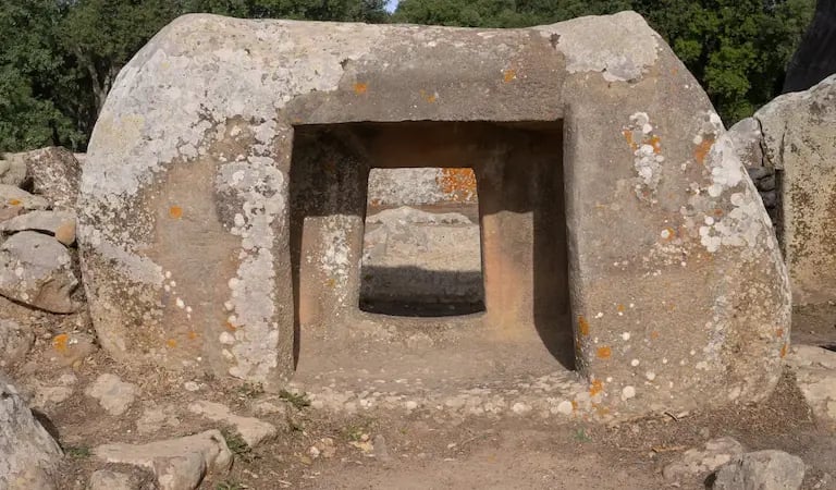 Megalithic tomb in Pranu Muttedu, Sardinia – prehistoric burial monument carved from stone, part of one of the largest necrop