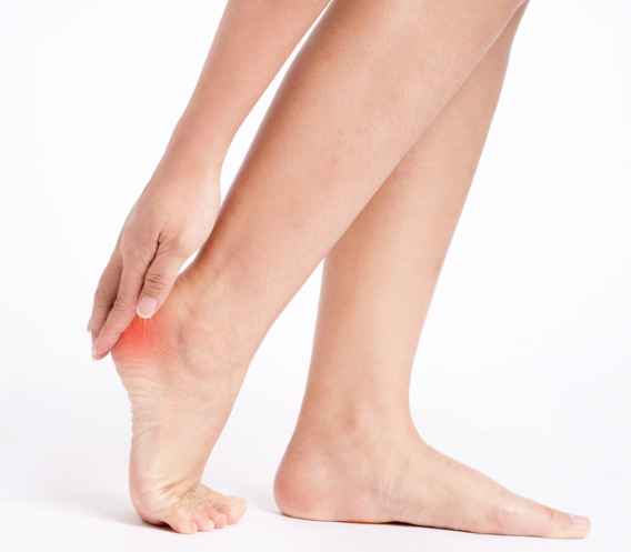 a person with a painful foot pain