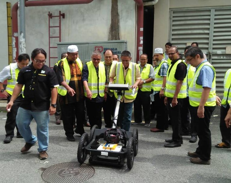 this is an image of a group of trainee going through on-site training for GPR