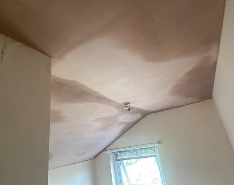 Fresh plaster finish on living room ceiling in Worcester, done by local professionals.