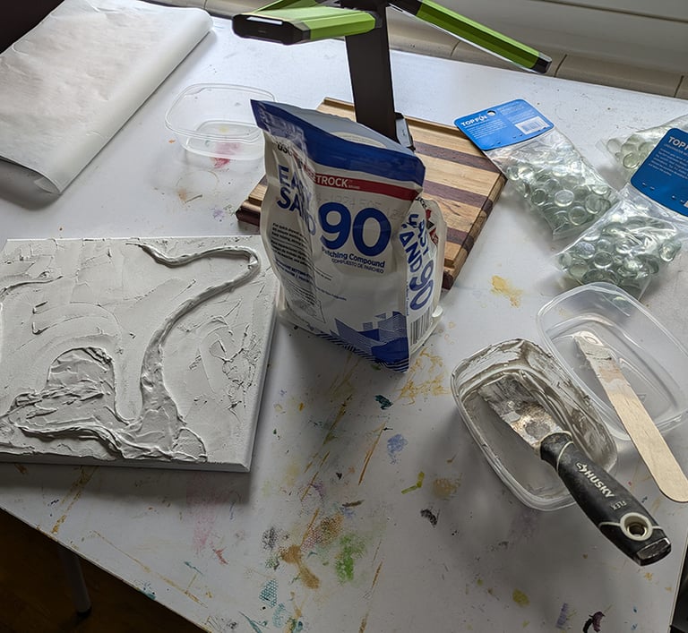 EasySand 90 as used for 3D relief sculpting on wall and stretched canvas.