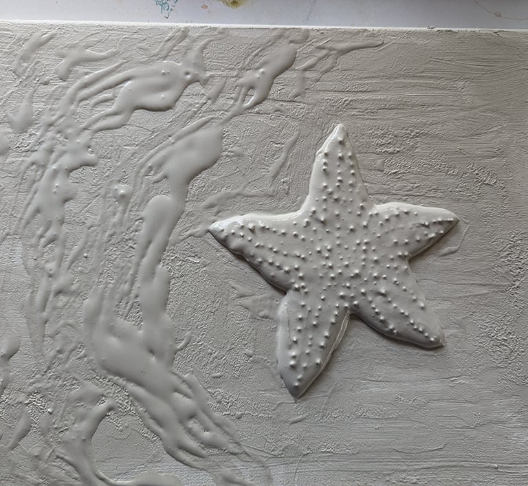3D relief sculpture with Easy Sand 90. Starfish in sandy surf during lowtide.