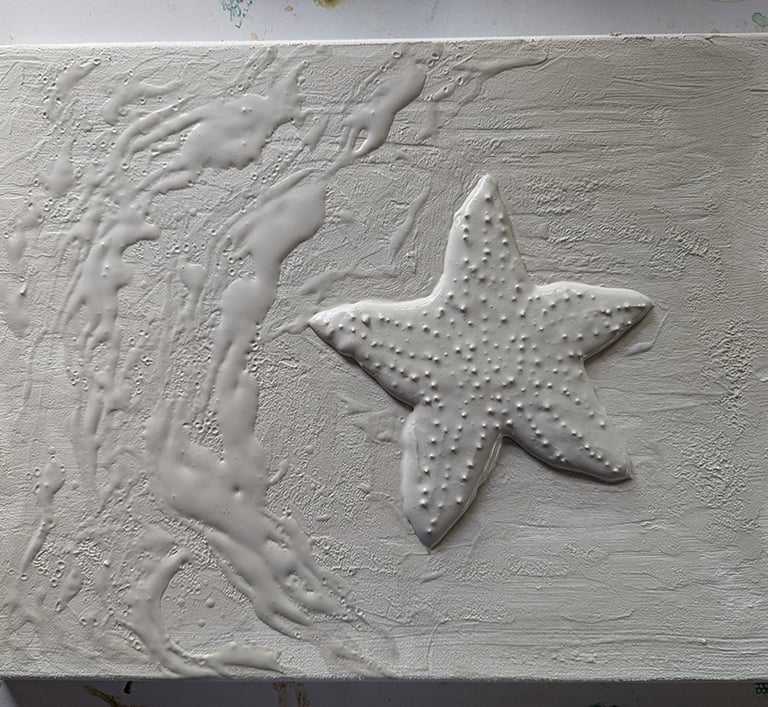 Easy Sand 90 as medium of choice for a 3D relief mural project featuring reef, ocean, surf, water, starfish, and octopus.