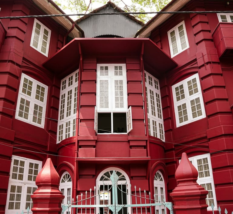 Koder House is a heritage hotel with a magnificent three-storied structure in brick-red at Fort Kochi.