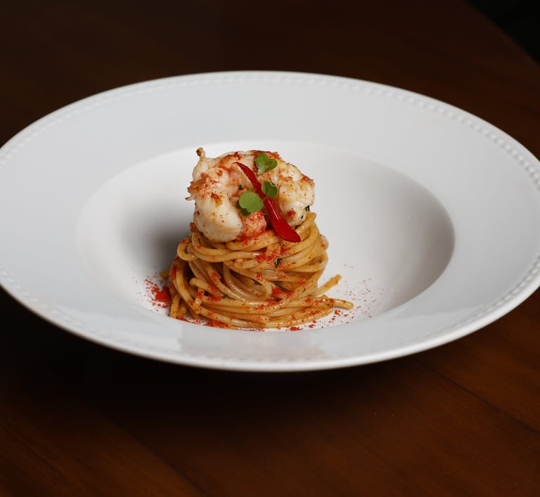 Casa Santo Antonio: spaghetti all’aglio e olio, peperone dolce e scampi. Foto: Rodrigo Marrano