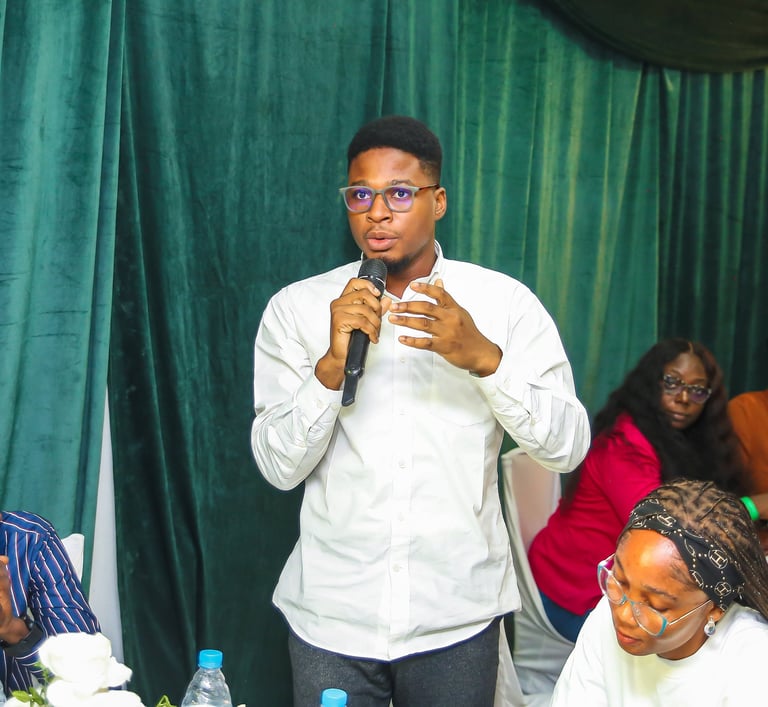 A participant at the Beyond Farming Summit asking a question to the panelists
