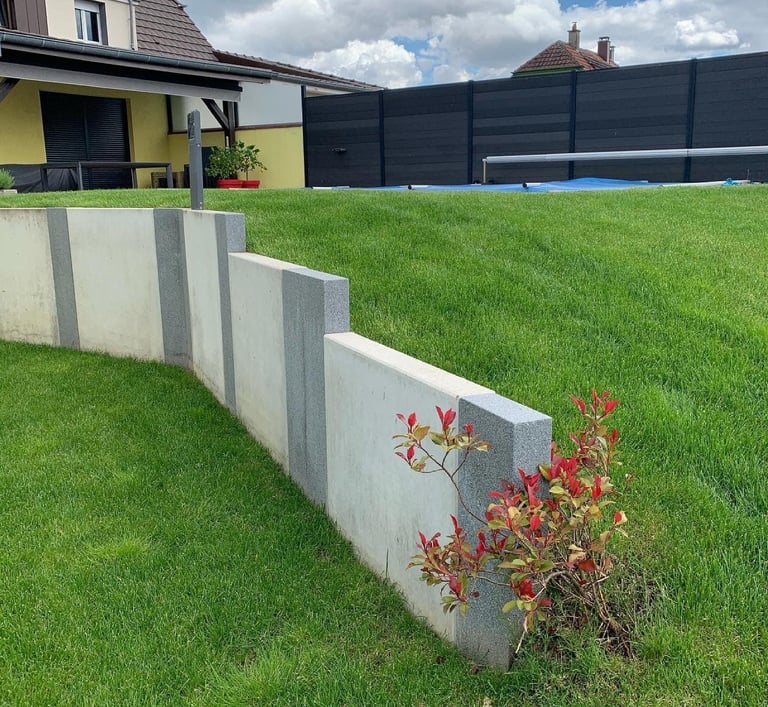 réalisation d'un muret paysager de soutènement avec des murs en L à wittenheim