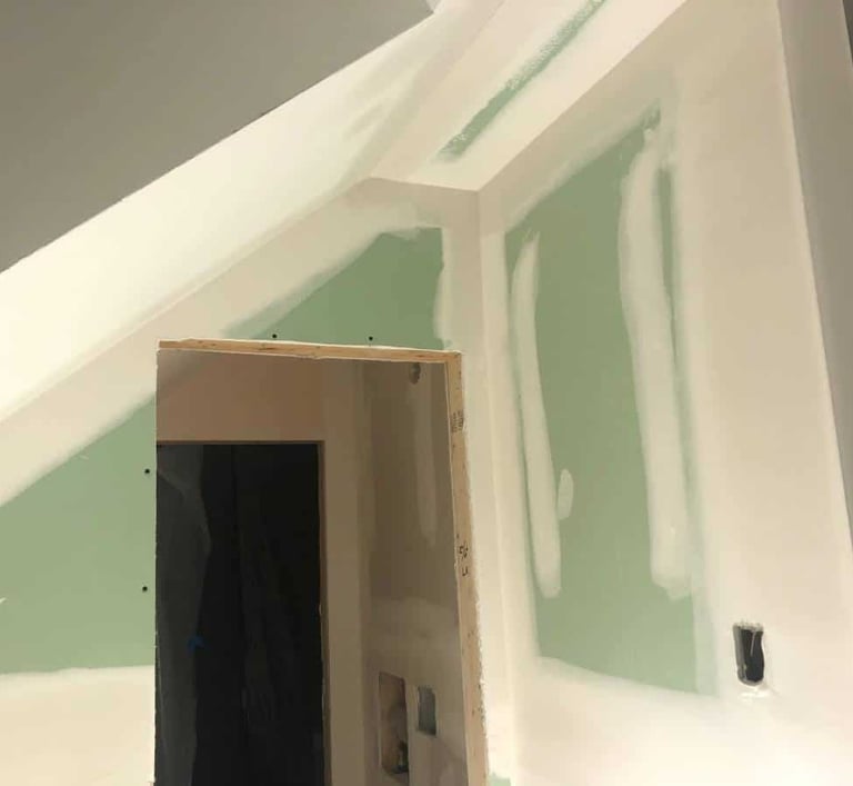 drywall taping in a bathroom