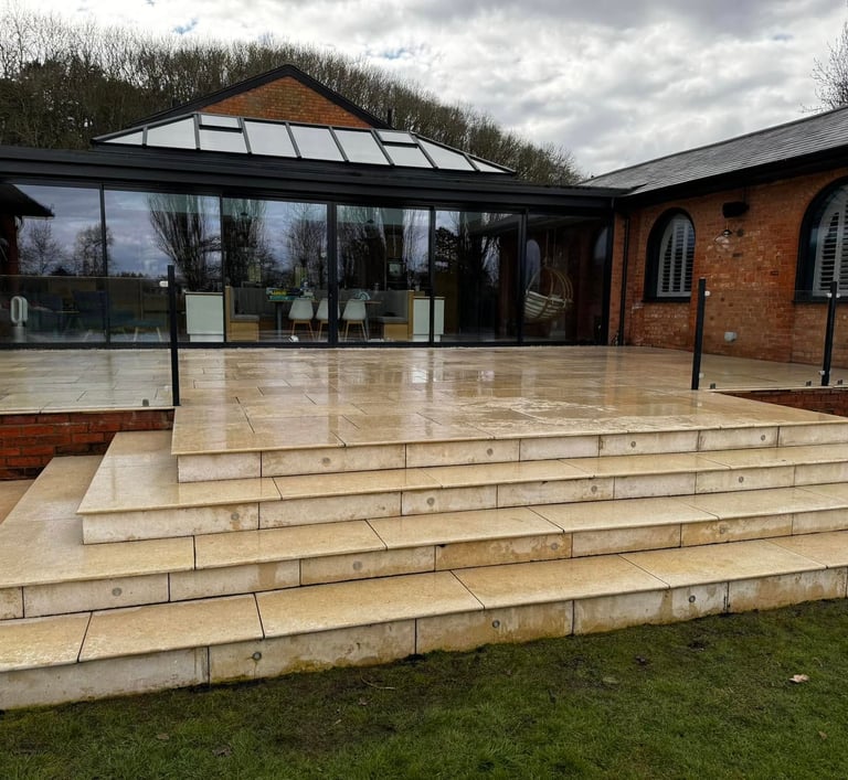 white patio layd in worcester by B R Building and Landscapes