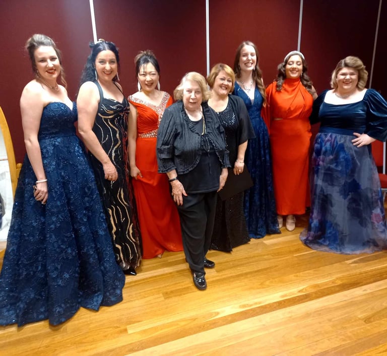 The seven sopranos who performed Ride of the Valkyries, with former SOS President Leona Geeves.