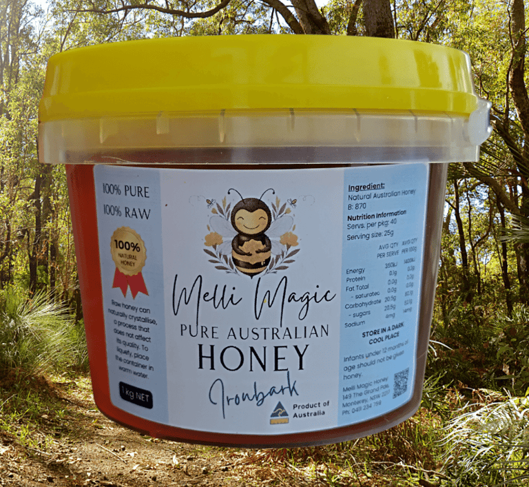 Melli Magic 1kg tub of pure raw Australian Ironbark honey set against a sunny forest background.