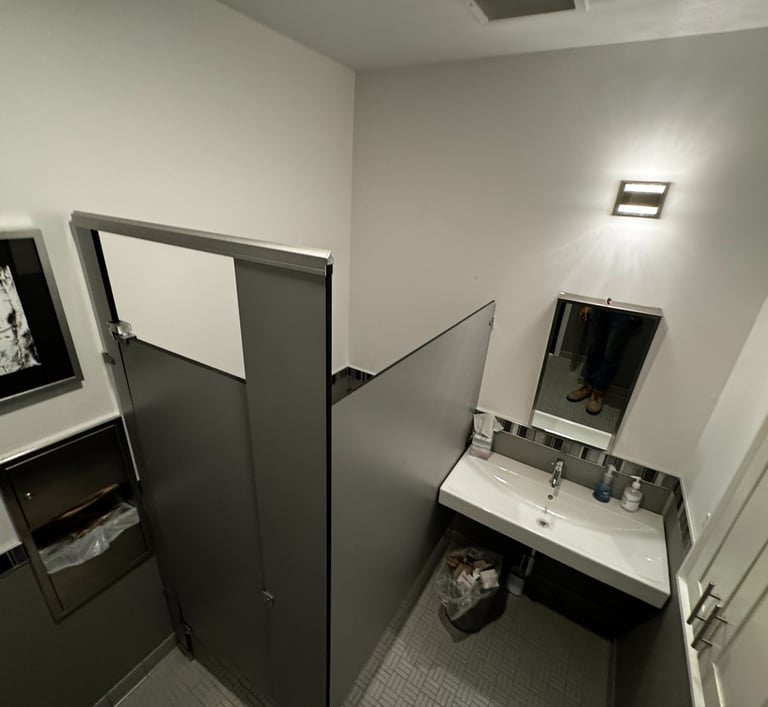 Bathroom stall divider installation. Commercial grade materials, very durable 