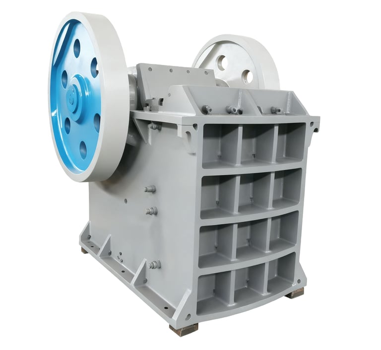 Stone crusher machine crushing large rocks into smaller aggregates at a quarry site.