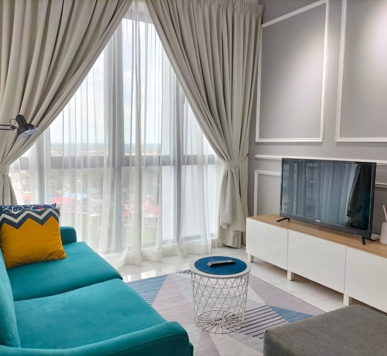 a living room with a couch and a television