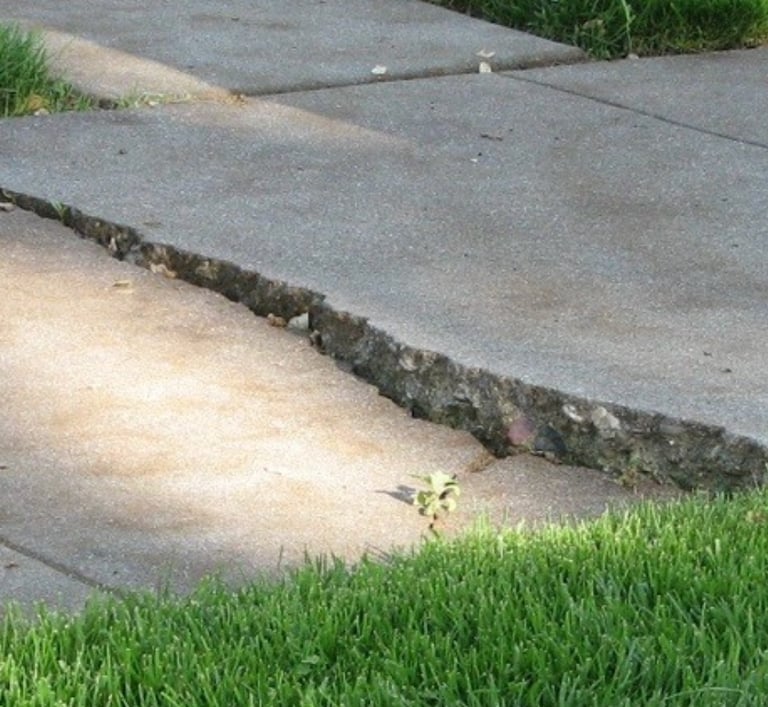 a fire hydrant sitting on the sidewalk