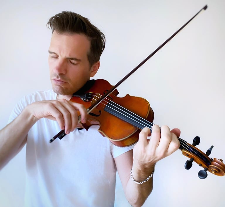 Luke Cissell playing violin