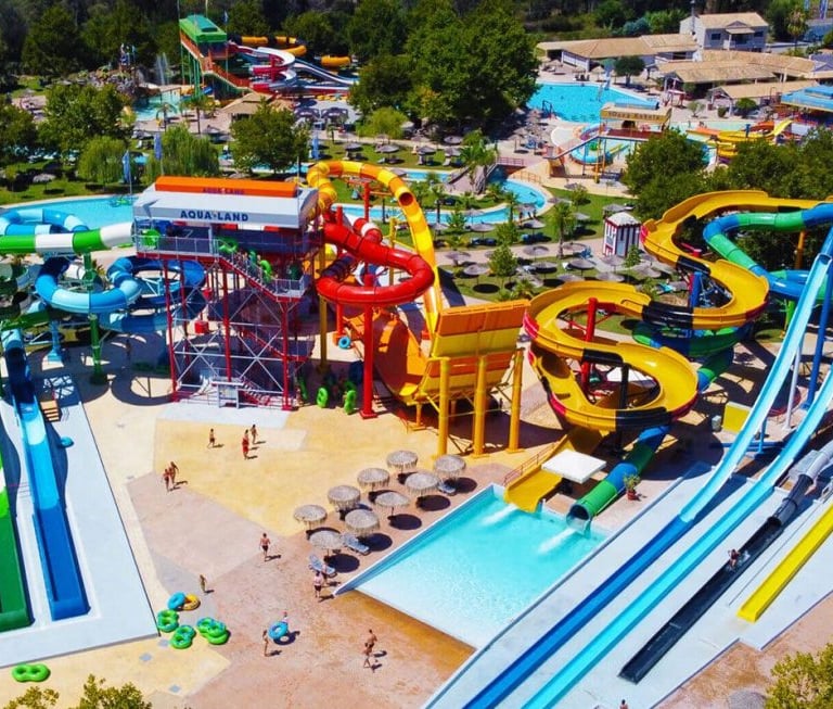 a water park with a large water slider and a large water park