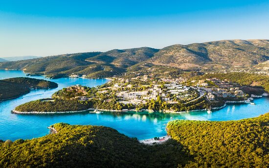 a view of a small island in the middle of a lake