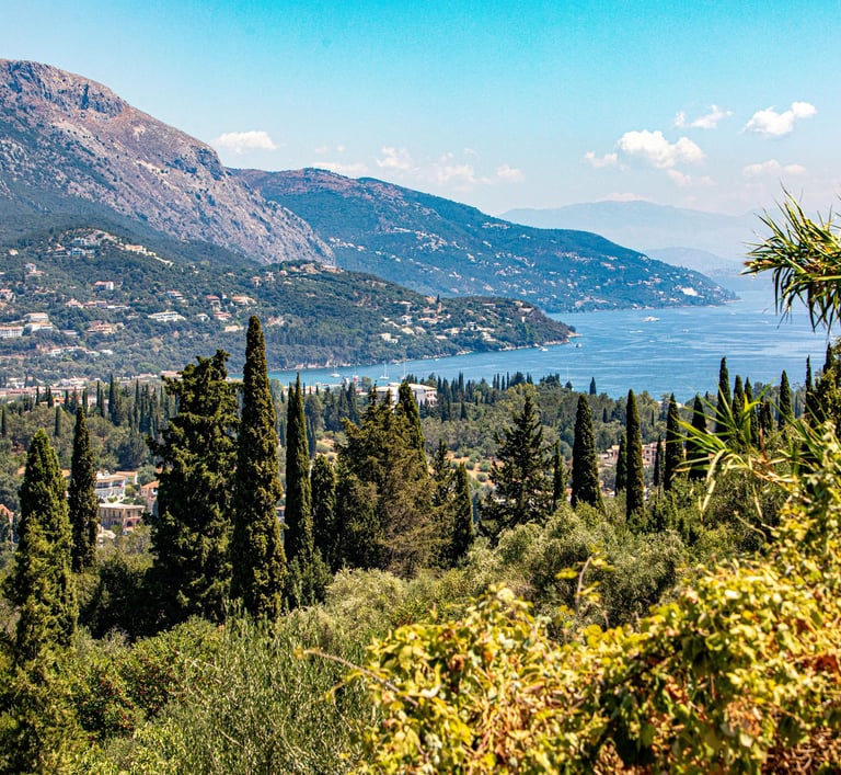 a view of a mountain range with a view of a lake and mountains