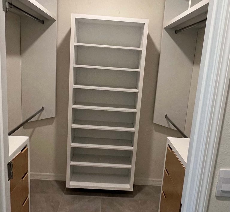 Picture of walk-in closet created by White and Wood Custom Carpentry in Orlando Florida