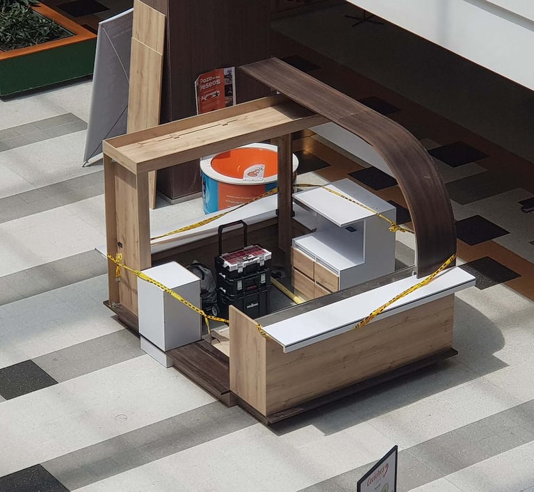 Picture of commercial isle stand designed by White and Wood Custom Carpentry in Orlando Florida