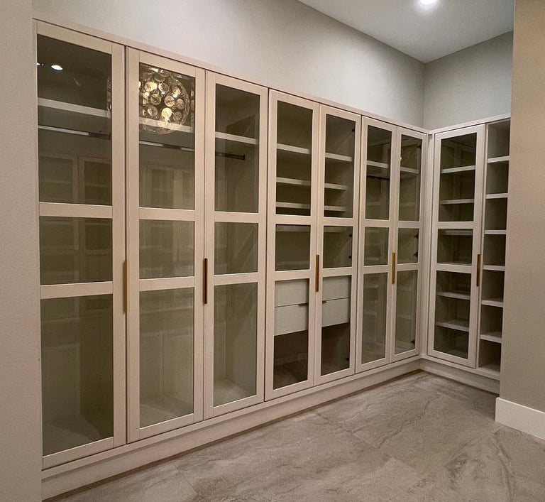 Picture of walk-in closet created by White and Wood Custom Carpentry in Orlando Florida