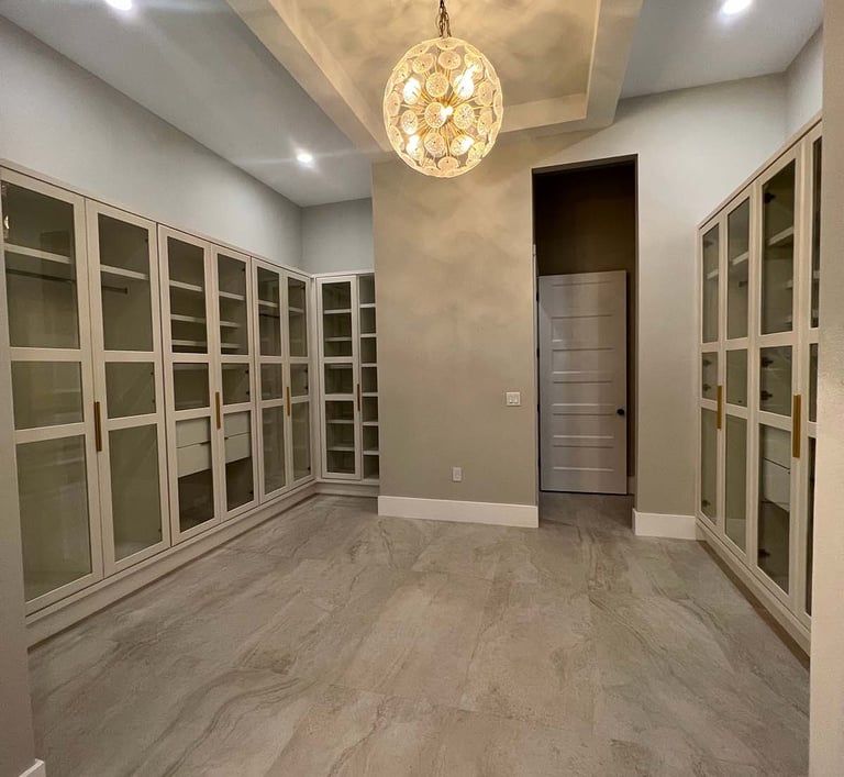 Picture of walk-in closet created by White and Wood Custom Carpentry in Orlando Florida