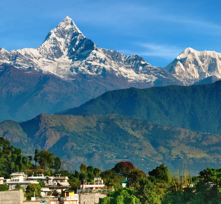 a mountain view of a town with a mountain in the background