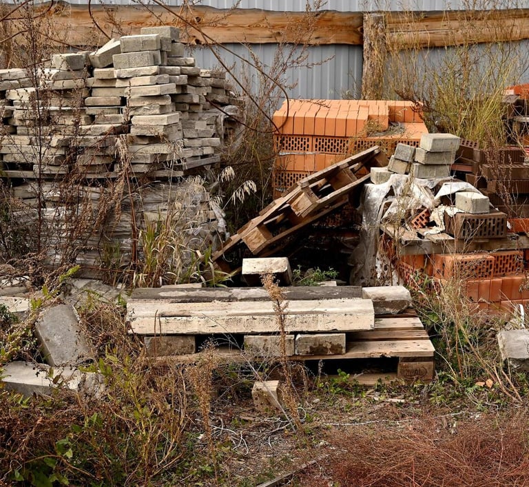 construction debris stacked on lot