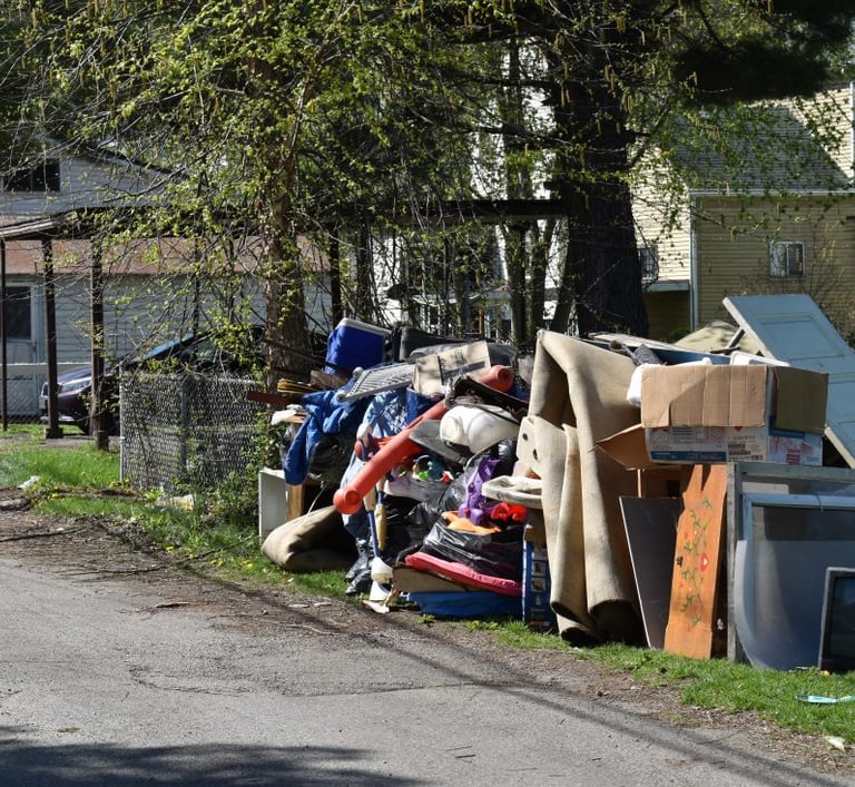 junk piled in front of house in McKinney, TX
