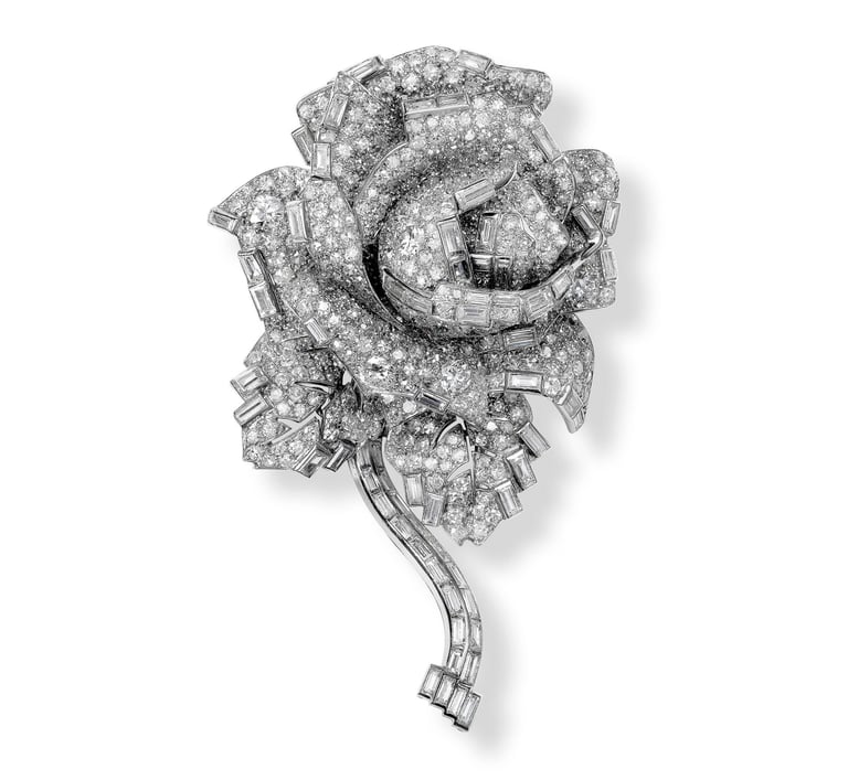 Cartier diamond rose brooch crafted with brilliant and baguette-cut diamonds.