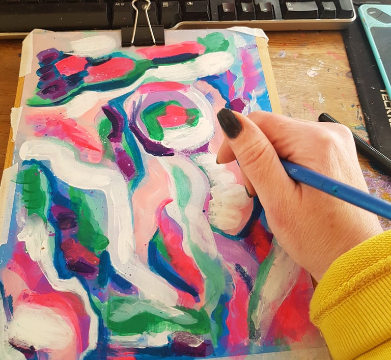 close up of me making a painting with acrylics