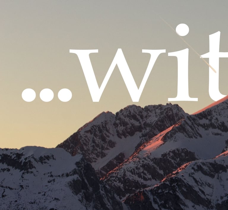 Snow-capped mountain peaks at sunset with white text overlay reading with.