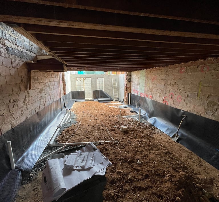 a room with a lot of dirt and a couch