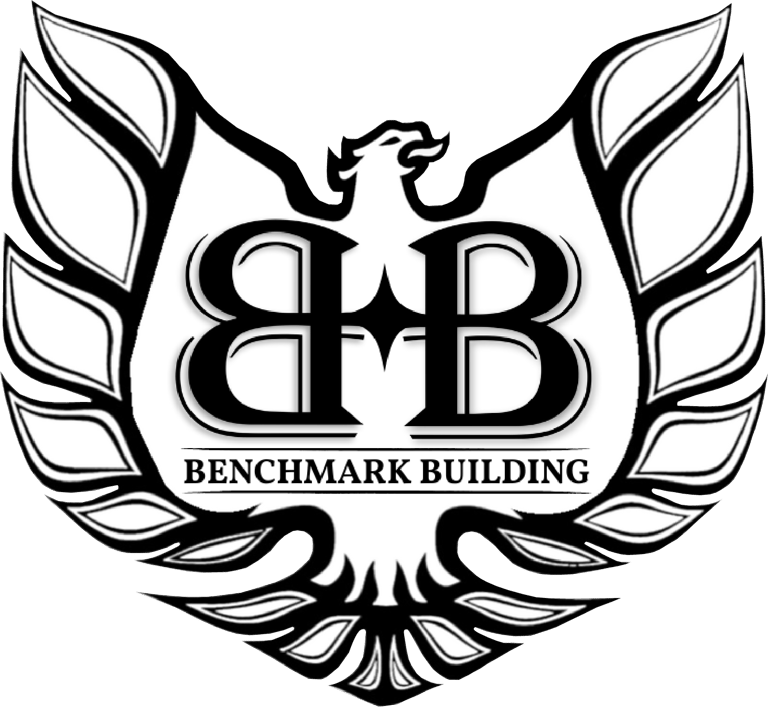 a logo for benchmark building